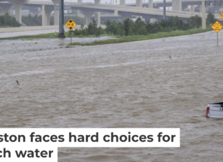 A roadside assistance vehicle is swamped by floodwaters on a Houston highway in 2024. Brandon Bell/Getty Images